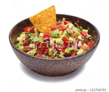 traditional salsa dip snack in wooden bowl and corn nacho chips isolated traditional salsa dip snack in wooden bowl and corn nacho chips isolated 112726791