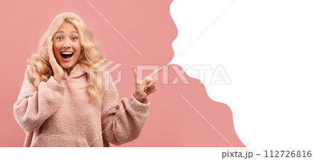 Blonde caucasian woman in excitement pointing to speech bubble, collage Blonde caucasian woman in excitement pointing to speech bubble, collage 112726816