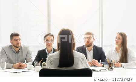 HR managers having job interview with female candidate HR managers having job interview with female candidate 112727427