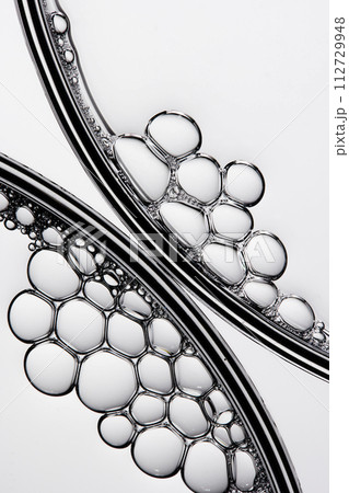 A close-up photo of water droplets that can be used in science, medicine, ingredients, and beauty designs. 112729948