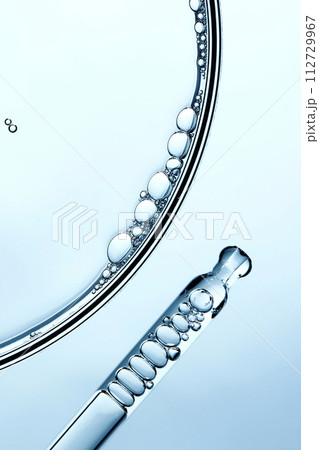 A close-up photo of water droplets that can be used in science, medicine, ingredients, and beauty designs. 112729967