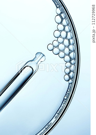 A close-up photo of water droplets that can be used in science, medicine, ingredients, and beauty designs. 112729968