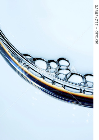 A close-up photo of water droplets that can be used in science, medicine, ingredients, and beauty designs. 112729970