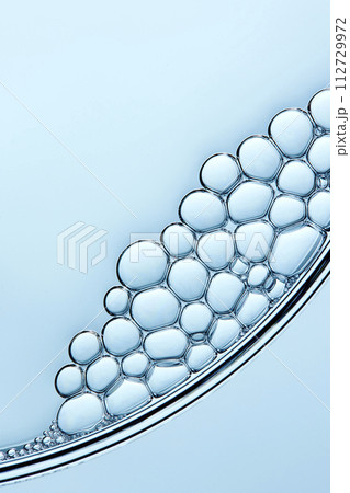 A close-up photo of water droplets that can be used in science, medicine, ingredients, and beauty designs. 112729972