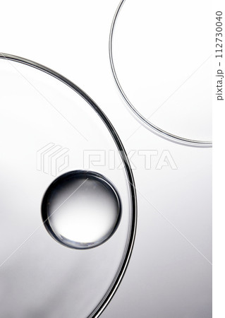 A close-up photo of water droplets that can be used in science, medicine, ingredients, and beauty designs. 112730040