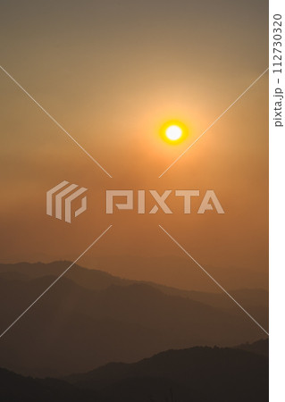 landscape and travel concept with sunset and twilight sky with layer of mountain landscape and travel concept with sunset and twilight sky with layer of mountain 112730320