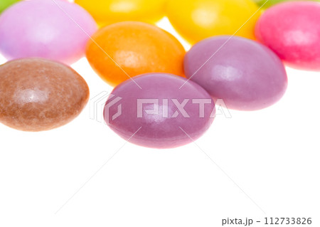 chocolate colored buttons isolated 112733826