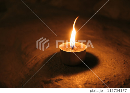 trench military candle isolated on white background. made by Ukrainian volunteers for soldiers serving on the front line. 112734177