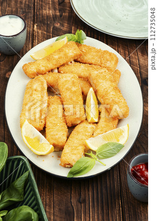 Fish fingers or nuggets, fast food. Fish fingers or nuggets, fast food. 112735048