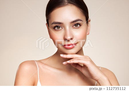 Portrait beautiful young woman with clean fresh skin Portrait beautiful young woman with clean fresh skin 112735112