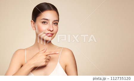 Portrait beautiful young woman with clean fresh skin 112735120