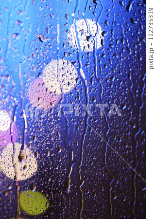 A relaxing time watching the rain outside the window. A relaxing time watching the rain outside the window. 112735319