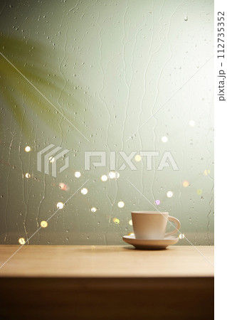 A relaxing time watching the rain outside the window. 112735352