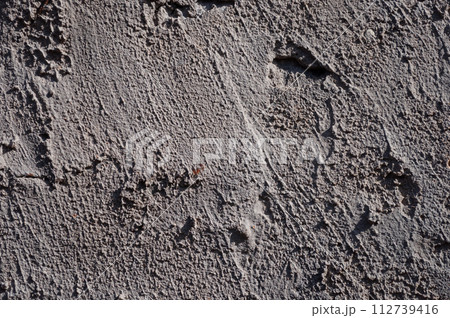 Gray uneven concrete background Gray uneven concrete background 112739416