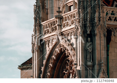 Close-up details of Matthias church in Fisherman bastion at sunset, Budapest, Hungary Close-up details of Matthias church in Fisherman bastion at sunset, Budapest, Hungary 112740848