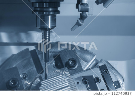 The 5-axis CNC milling machine  cutting the automotive part with solid ball end mill tool. 112740937