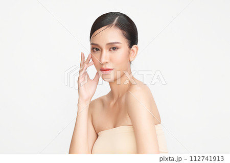 Beautiful young asian woman with clean fresh skin on white background, Face care, Facial treatment, Cosmetology, beauty and spa, Asian women portrait. Beautiful young asian woman with clean fresh skin on white background, Face care, Facial treatment, Cosmetology, beauty and spa, Asian women portrait. 112741913