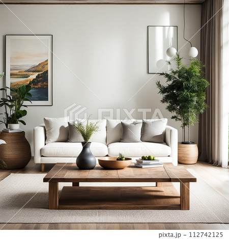 Interior of modern living room with white walls, wooden floor, white sofa, coffee table and plants in pots. 112742125