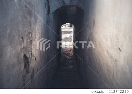 Old narrow arched corridor between buildings in old town of Szentendre, Hungary 112742259