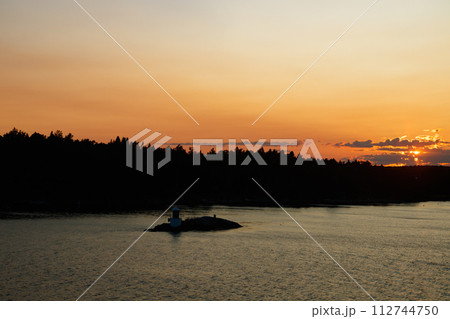Magical sunset over the Gulf of Finland, Baltic sea. View from the ship 112744750