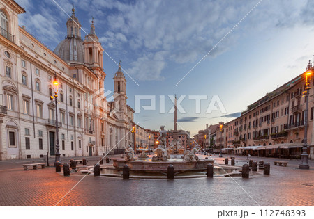 The famous fountains with tritons in Piazza Navona in Rome at dawn. The famous fountains with tritons in Piazza Navona in Rome at dawn. 112748393