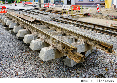 Tram rails with concrete sleepers replacement in city street 112748535