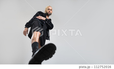 Gay man wearing women clothing dancing 112752016