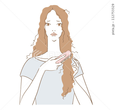 傷んだ髪のブラッシングに困っている美しい女性 112753329