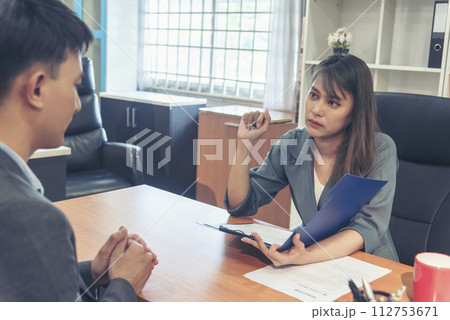 Job Interview with headhunter agent and applicant. Job HR applicants having an interview with Human resource manager jobs interviewing with confident candidate at business firm office give cv resume 112753671