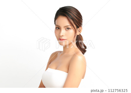 Beautiful young asian woman with clean fresh skin on white background, Face care, Facial treatment, Cosmetology, beauty and spa, Asian women portrait. Beautiful young asian woman with clean fresh skin on white background, Face care, Facial treatment, Cosmetology, beauty and spa, Asian women portrait. 112756325