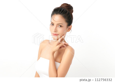Beautiful young asian woman with clean fresh skin on white background, Face care, Facial treatment, Cosmetology, beauty and spa, Asian women portrait. Beautiful young asian woman with clean fresh skin on white background, Face care, Facial treatment, Cosmetology, beauty and spa, Asian women portrait. 112756332