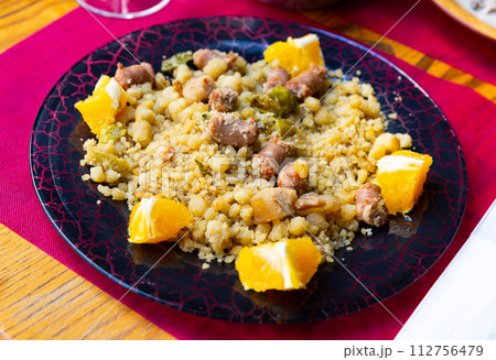 Typical spanish dish from semolina flour with longaliza sausage 112756479