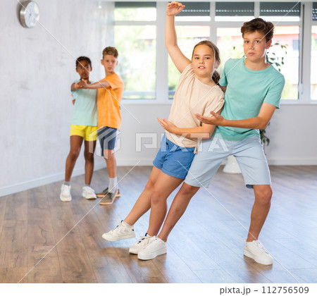 Girl and boy practicing dance in pairs in wellness center 112756509