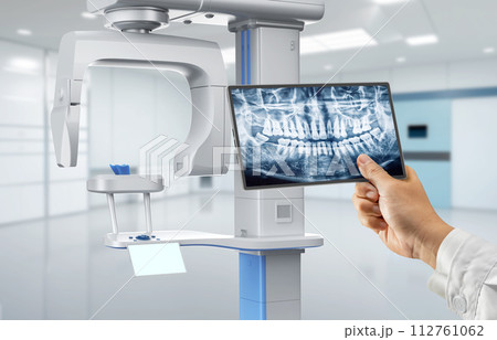 Dentist analyze digital x-ray film from scanner machine Dentist analyze digital x-ray film from scanner machine 112761062