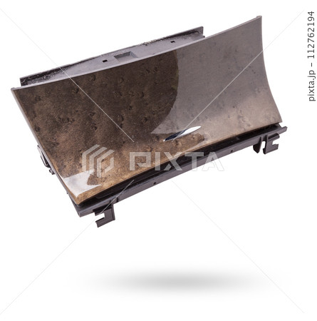 An opened ashtray from panel of car interior separately on a white isolated background with wooden decorative overlay. An opened ashtray from panel of car interior separately on a white isolated background with wooden decorative overlay. 112762194