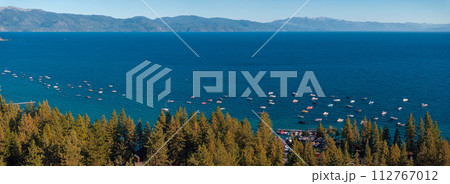 Beautiful aerial view of the Tahoe lake from above in California, USA. Wild forests, fresh air and mountains of California. 112767012