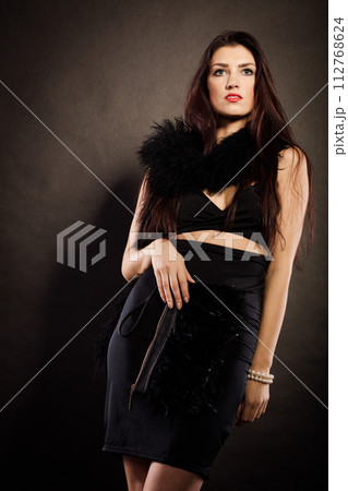 woman evening dress handbag in hand on black woman evening dress handbag in hand on black 112768624