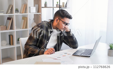 Work pressure exhausted employee man laptop office 112768626