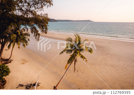 Beach and sea in the evening, high angle view Beach and sea in the evening, high angle view 112769395