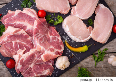 Steak from raw pork neck 112772910