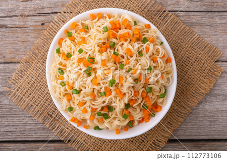 Instant noodles with carrot and green onion Instant noodles with carrot and green onion 112773106