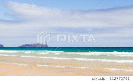 Empty sandy beach landscape on a summer day. Madeira, Portugal Empty sandy beach landscape on a summer day. Madeira, Portugal 112773791