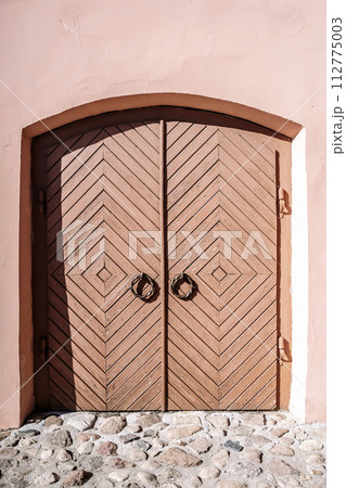 Old barn gate. Wooden rustic gate for a warehouse, stable or barn 112775003