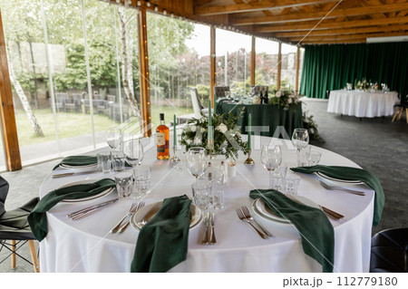 a food and drinks on the wedding table in the restaurant at the banquet 112779180