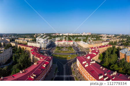 Aerial top view to railway station st. Petrozavodsk-Passenger. Building are on Gagarin square and Lenin Avenue in center of city in sunny summer day. Petrozavodsk city is capital of Karelia. Russia Aerial top view to railway station st. Petrozavodsk-Passenger. Building are on Gagarin square and Lenin Avenue in center of city in sunny summer day. Petrozavodsk city is capital of Karelia. Russia 112779334