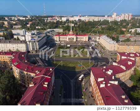 Aerial top view to railway station st. Petrozavodsk-Passenger. Building are on Gagarin square and Lenin Avenue in center of city in sunny summer day. Petrozavodsk city is capital of Karelia. Russia Aerial top view to railway station st. Petrozavodsk-Passenger. Building are on Gagarin square and Lenin Avenue in center of city in sunny summer day. Petrozavodsk city is capital of Karelia. Russia 112779339