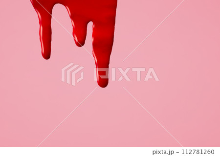 Blood on pink background. First menstrual period concept, menstruation cycle period 112781260
