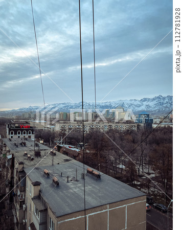 Cityscape with apartment buildings and trees from above 112781928