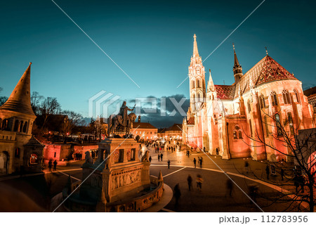 Matthias church and statue of King Stephen I at night. Fisherman's bastion, Budapest, Hungary 112783956