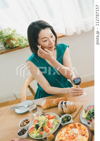 a forty-something woman a forty-something woman 112787157